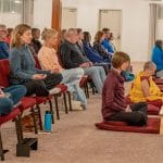 Group meditating Hall