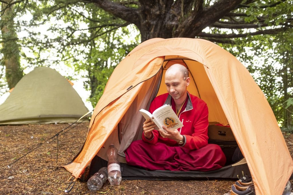 Monk_reading_tent_festival