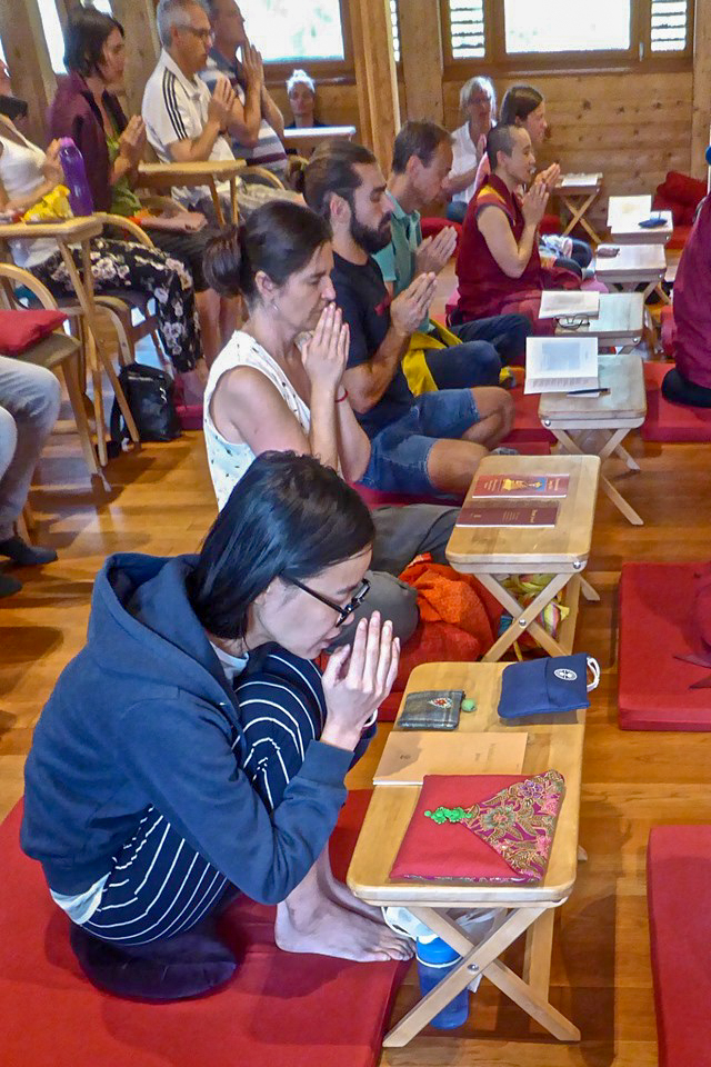 Group-praying-Temple