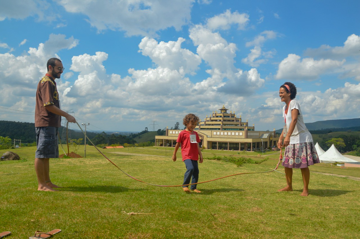 Family playing on the grounds at KMC Brazil.